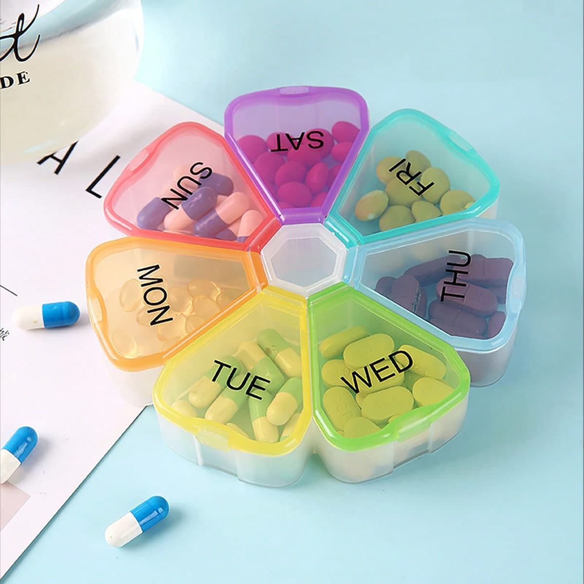 1 boîte de rangement hebdomadaire pour pilules en forme de pétale avec 7 compartiments, boîte de rangement pour médicaments en forme de capsule